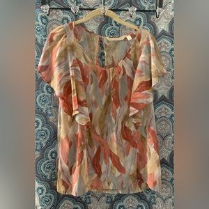 Lauren Conrad Sleeveless Butterfly Blouse w/ bold feather print in muted colors.